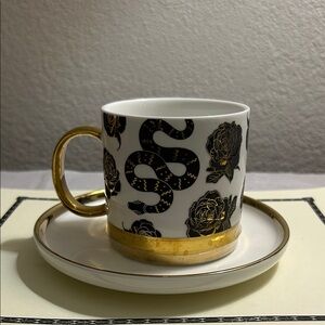 Elegant Gold and Black Snake Design Cup and Saucer